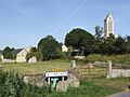 Vue d'ensemble de la Ferme de la Marguerie et l'Église Saint-Romain d'Étréham DSCF2663