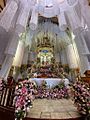 Interior de la Parroquia de Santa Maria Magdalena decorada para la fiesta patronal