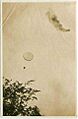 View of a German observation balloon bursting into flames, with a German observer jumping out of the balloon with a parachute, after the balloon was hit by guns from American airplanes somewhere in (29248114774)