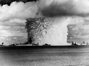 USS Saratoga (CV-3) and other ships are hit by Crossroads Baker nuclear blast, 25 July 1946.jpg