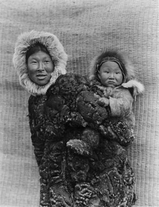 Woman and child - Nunivak - Edward S. Curtis - restoration1.jpg