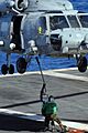 Defense.gov News Photo 100715-N-7605J-172 - U.S. Navy sailors attach a cargo pendant to an HH-60H Seahawk helicopter assigned to Helicopter Anti-Submarine Squadron 4 during a vertical