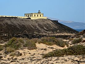 Light house on a cliff at Isla de Lobos.jpg