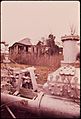 MADEWOOD, AN ANTI-BELLUM PLANTATION LEFT TO THE DESTRUCTION OF THE ELEMENTS AND VANDALS, IS SURROUNDED BY A PETRO... - NARA - 545982