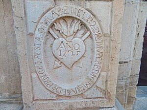 Archivo:Bajorrelieve con inscripción fundacional esculpido en la fachada de la iglesia parroquial de Castellfort