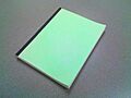 Paperback book with green cover