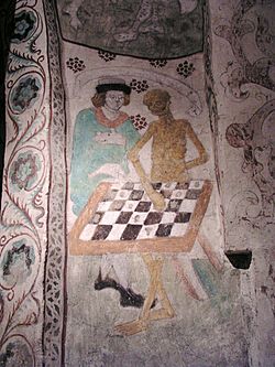 Archivo:Taby kyrka Death playing chess