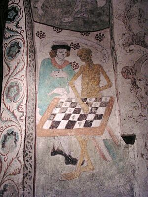 Archivo:Taby kyrka Death playing chess
