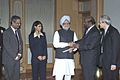 Shri Shiv Nadar and Ms Roshni Nadar presenting a cheque of Rs. 4 crore to the Prime Minister, Dr. Manmohan Singh, towards the Prime Minister's National Relief Fund in New Delhi on January 17, 2005