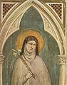 Fresco depicting Clare of Assisi holding a lily