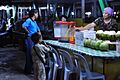 Child Buying Coconut Drink