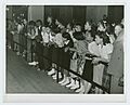 Crowds watching roller-skating exhibition, Chicago, Illinois