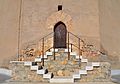 Porta i escales de la torre de les campanes de Xèrica