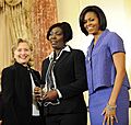 Sonia Pierre with Hillary Clinton and Michelle Obama 2010-03-10