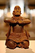 Archivo:WLA metmuseum Maya Wood Mirror Bearer 6th century