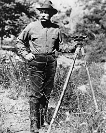 Portrait of William Mulholland with a surveyor's scope on a tripod, ca.1908-1913 (CHS-14459).jpg