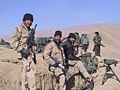 SF Sgt Mario Vigil with SF and NA forces west of Konduz in November 2001