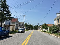 2017-08-21 13 58 11 View west along Maryland State Route 821 (Main Street) at Railroad Avenue in Marydel, Caroline County, Maryland.jpg