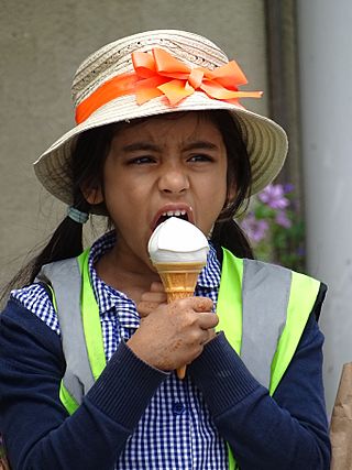 Girl with Ice Cream - Southend-on-Sea - Essex - England (27713936233).jpg