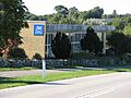 Jehovas Vidners Stævnehal i Herlufmagle. jw.org på siden af Spisesalen