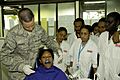 US Navy 080807-N-0209M-001 Air Force Tech. Sgt. Brian Madison holds dental training with students at the University of Papua New Guinea School of Health and Medical Science