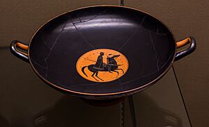Archivo:Epiktetos ARV 70 3 young horseman - satyr with jug and trumpet (01)