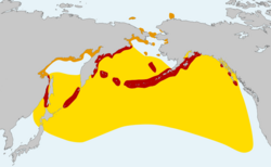 Residente (rojo), área de reproducción (naranja), invernante (amarillo).