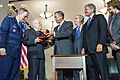 Leaders of the U.S. House and Senate present a Congressional Gold Medal in honor of the members of the Civil Air Patrol of World War II