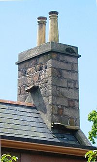 Archivo:Witches' stones on tiled roof Jersey 2
