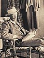 George Herbert, 5th Earl of Carnarvon, reading