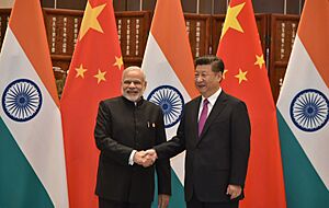 Archivo:The Prime Minister, Shri Narendra Modi with the President of the People's Republic of China, Mr. Xi Jinping, during G20 Summit 2016, in Hangzhou, China on September 04, 2016 (2)