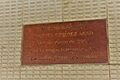 Placa a la memoria de M. Giménez Abad