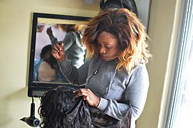 Woman Weaves Hair in Salon 03