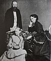 Queen Olga of Württemberg with her husband and their foster daughter