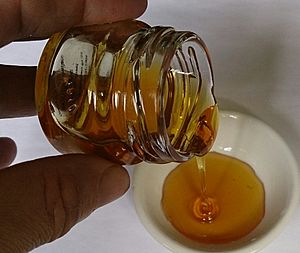 Archivo:Honey from jar