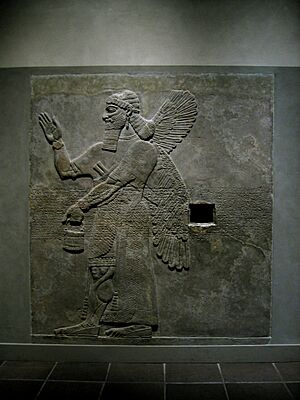 Archivo:Assyria relief of the wing king