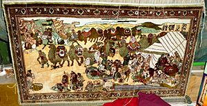Archivo:Moden carpet illustrating camel caravan on Silk Road. Kashgar