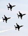 Four Thunderbird F-16 display diamond formation