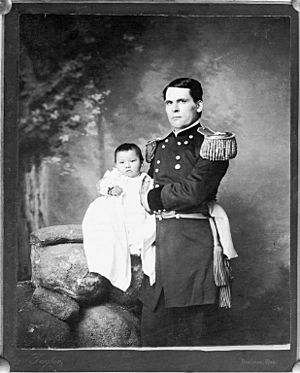 Portrait of General L. W. Colby of Nebraska State Troops Holding Baby Girl, Zintkala Nuni (Little Lost Bird), Found On Wounded Knee Battlefield, South Dakota, 1890 n.d.jpg