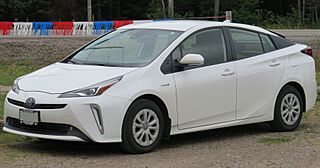 2019 Toyota Prius AWD-e in Super White, Front Left, 08-21-2022.jpg