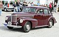 1939 Opel Kapitän, Owner Arild Nilssen who, as his lady companion wear matching attire cropped to highlight the car
