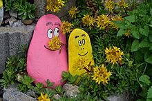 Matrei - bemalte Steine in Pflanzstein.jpg
