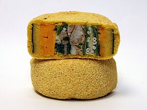 Archivo:The Best Sushi South of the Mason Dixon Line - Grits, Cheddar Cheese, Catfish and Okra