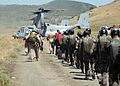 US Navy 110623-N-ZZ999-003 Marines assigned to the 22nd Marine Expeditionary Unit (22nd MEU) and Spanish marines embark an MV-22B Osprey assigned t