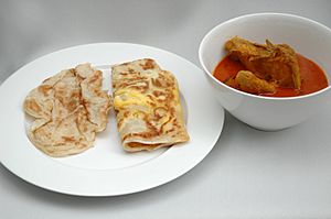 Archivo:Roti Prata Curry Large