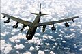 B-52 flying over clouds