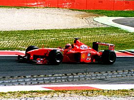 Archivo:Eddie Irvine 1999 Monza
