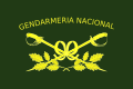 Bandera de la Gendarmería Nacional Argentina, única de este lista sin el celeste y/o blanco, si no que tiene  dos sables amarillos con un fondo verde