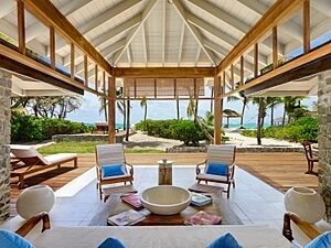 Archivo:PSV 2 Bed Beach Cottage Lounge Area at Petit St. Vincent Island Resort - The Grenadines, St. Vincent, Caribbean.