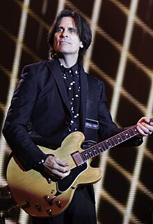 Paul McCartney - Out There Concert - Rusty Anderson 2014(cropped).jpg